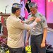 Pj Walikota Roberia Terima Pin Emas dari Kapolri
