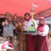Miniatur Tugu Harimau Karya Zuwirman dalam Pawai Alegoris, Dipersembahkan untuk Bupati Agam