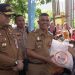 Pj Wako Padang Serahkan Bantuan Pangan, Kurangi Beban Ekonomi dan Tekan Stunting
