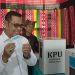 Bupati Epyardi Asda Lakukan Pencoblosan di TPS 006 Singkarak