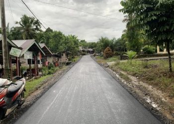 Pengaspalan Jalan Simpang Ponpes An-Nur Tanjung Beringin V Rampung