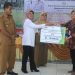 Wabup Dharmasraya Serahkan Bantuan ATENSI bagi Disabilitas, Lansia, dan Anak Terlantar